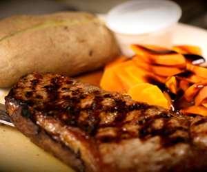 grilled steak and baked potato